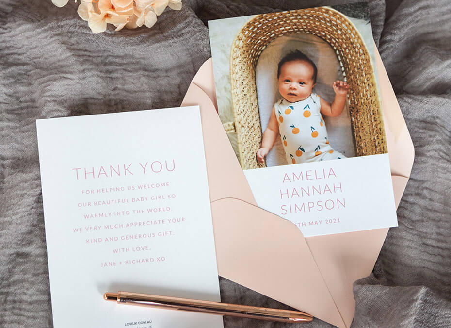 Photo of a Love JK Birth Announcement Card Showing front back and Luxe Pink Envelope